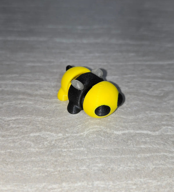 Bee 3D printed articulated flexi toy by Cosmic 3D Creations
