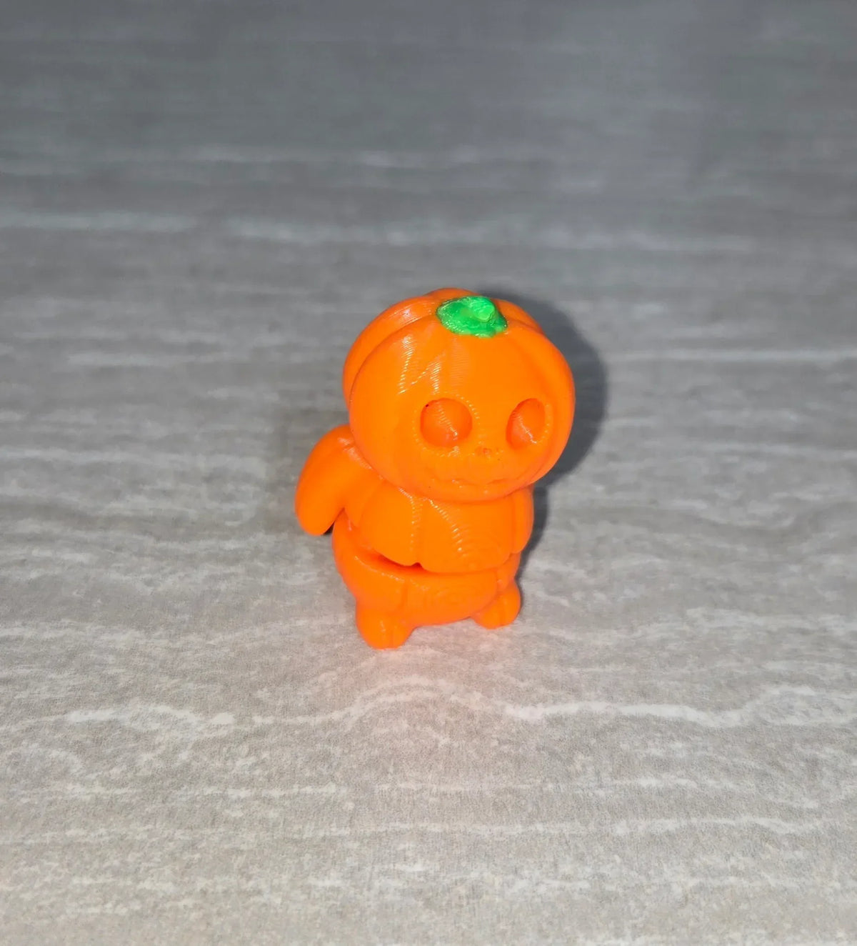 Pumpkin 3D printed articulated flexi toy by Cosmic 3D Creations