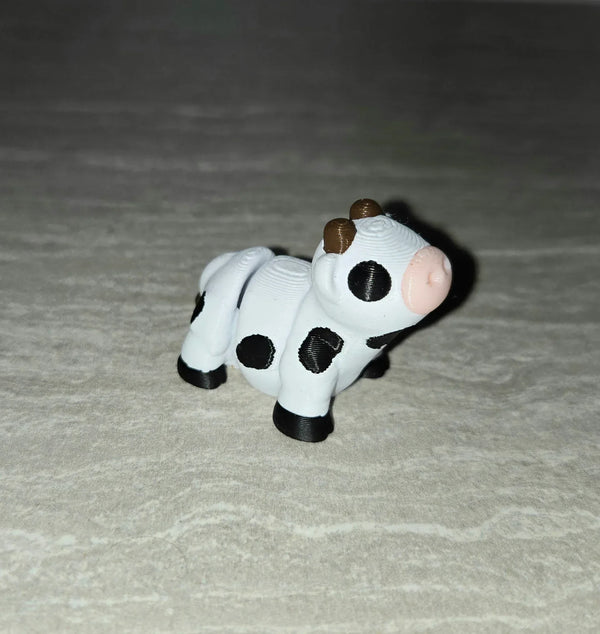 Cow w/ Spots 3D printed articulated flexi toy by Cosmic 3D Creations