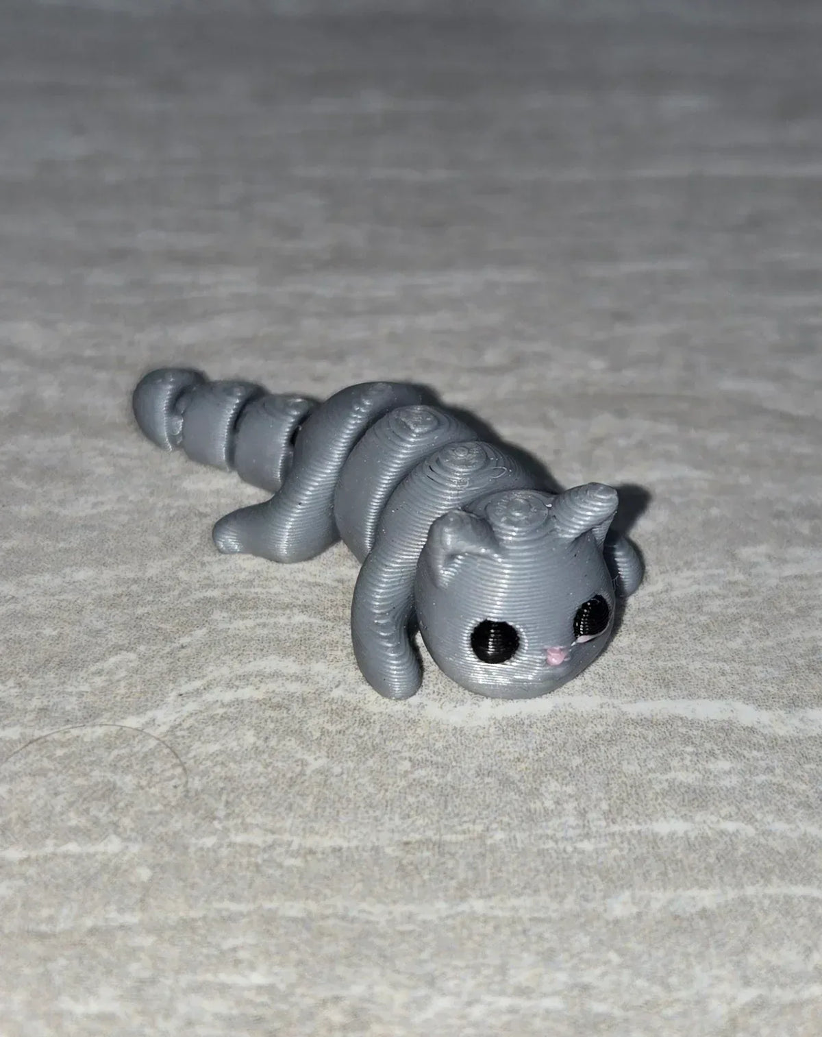 Cat 3D printed articulated flexi toy by Cosmic 3D Creations