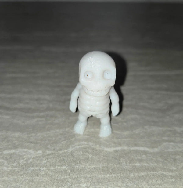 Skeleton 3D printed articulated flexi toy by Cosmic 3D Creations