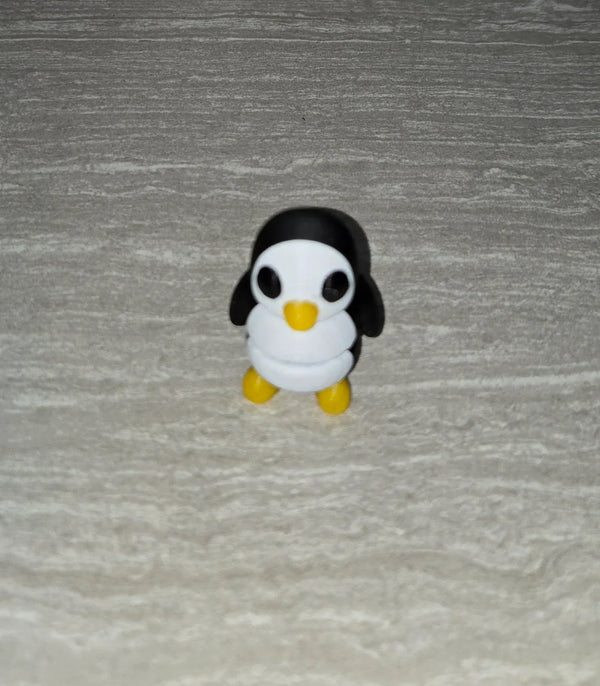 Penguin 3D printed articulated flexi toy by Cosmic 3D Creations