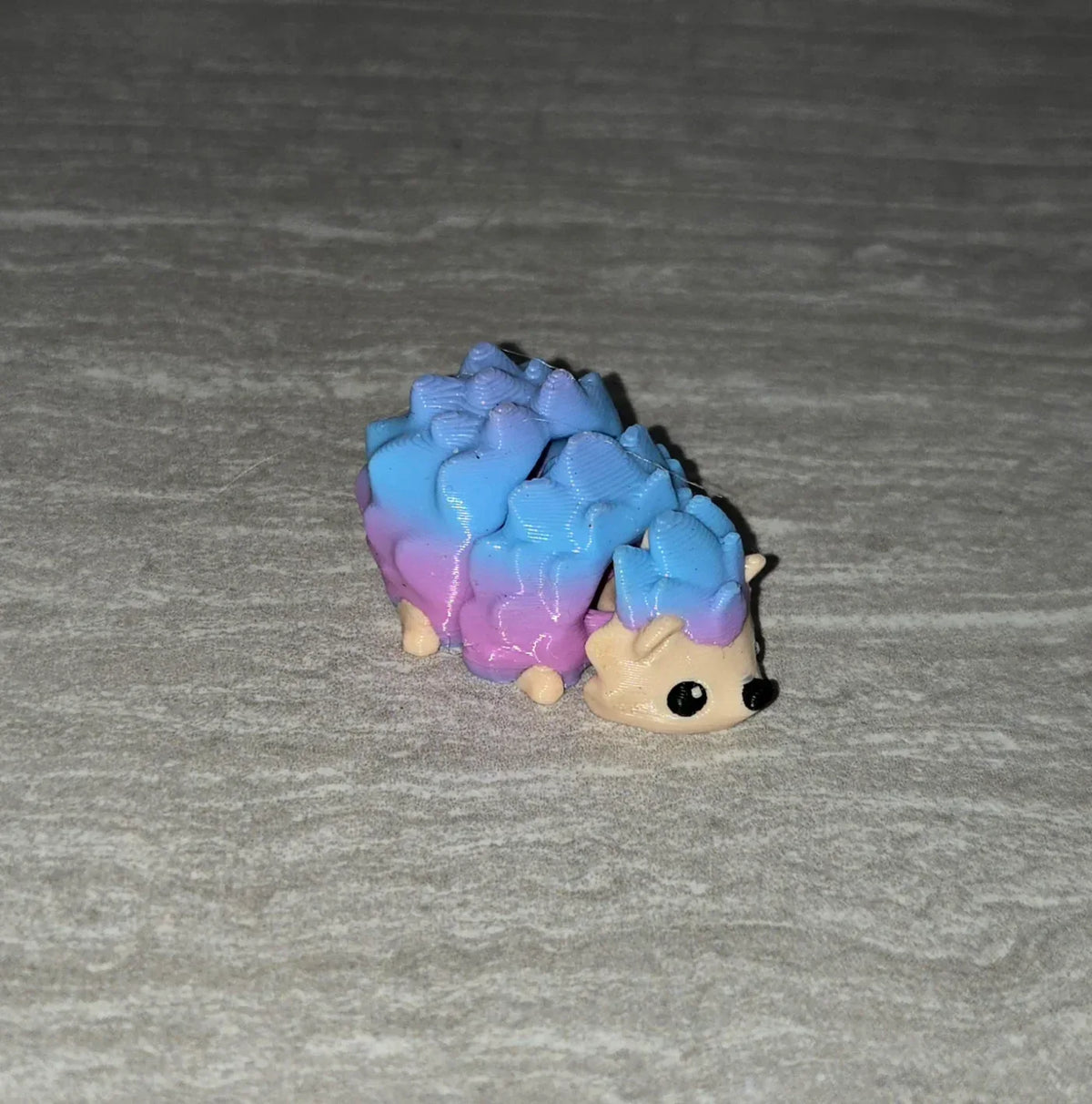 Hedgehog 3D printed articulated flexi toy by Cosmic 3D Creations