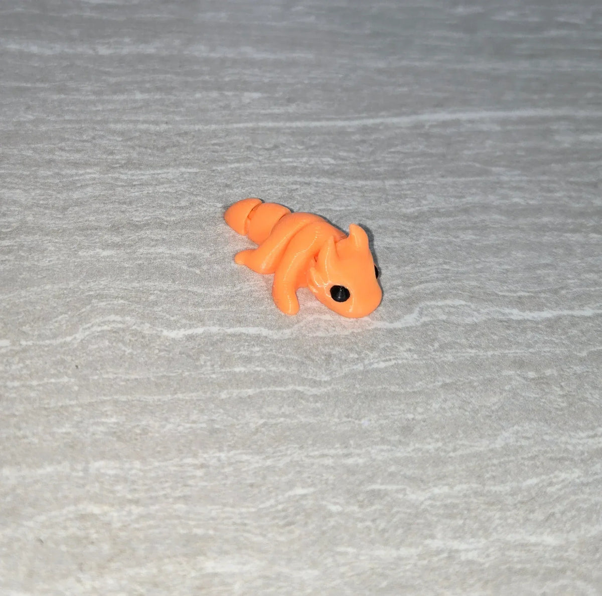 Dragon 3D printed articulated flexi toy by Cosmic 3D Creations