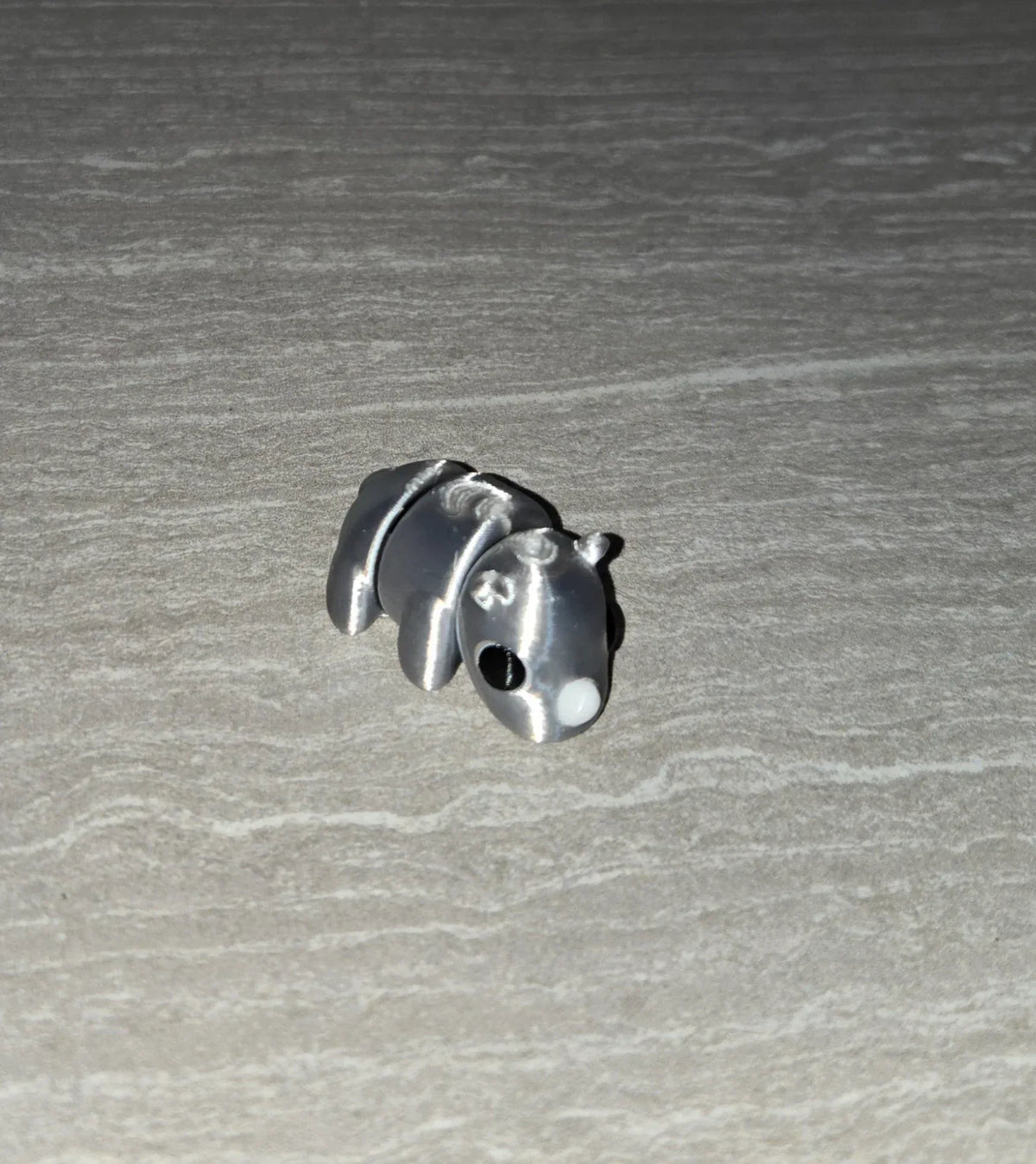 Rhino 3D printed articulated flexi toy by Cosmic 3D Creations