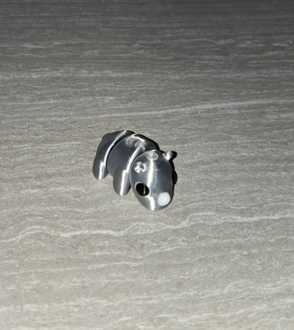 Rhino 3D printed articulated flexi toy by Cosmic 3D Creations