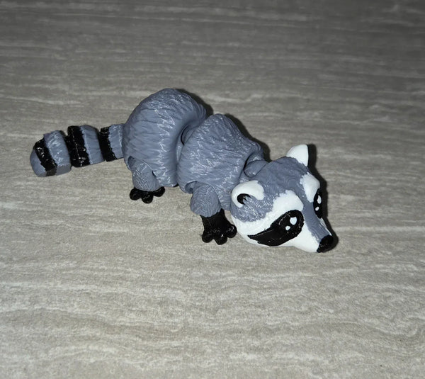 Mini Raccoon 3D printed articulated flexi toy by Cosmic 3D Creations