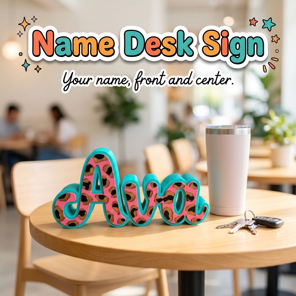 Name Desk Sign 3D printed personalized standing sign with the sample name Ava in leopard print by Cosmic 3D Creations, on a cafe table