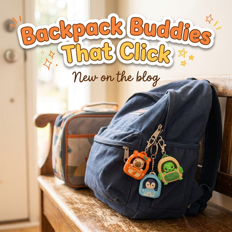 Backpack Buddies That Click: blog cover from Cosmic 3D Creations with Capybara, Penguin and Turtle Backpack Buddies clicker keychains clipped to a blue school backpack