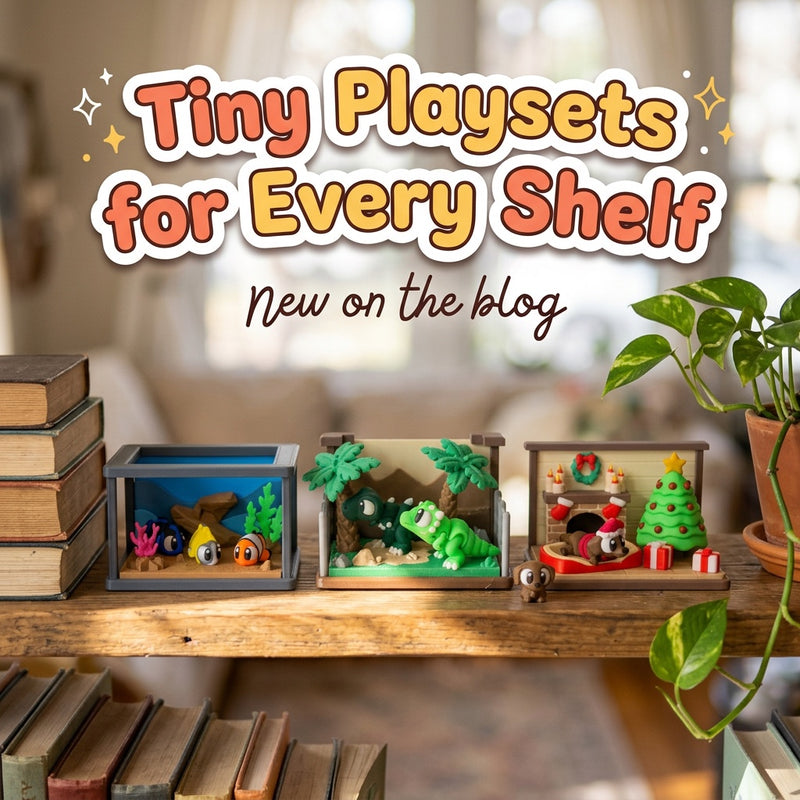 Tiny Playsets for Every Shelf: blog cover from Cosmic 3D Creations with the Fish Tank, Dino and Christmas Dachshund playsets on a wooden bookshelf