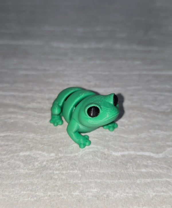 Frog 3D printed articulated flexi toy by Cosmic 3D Creations