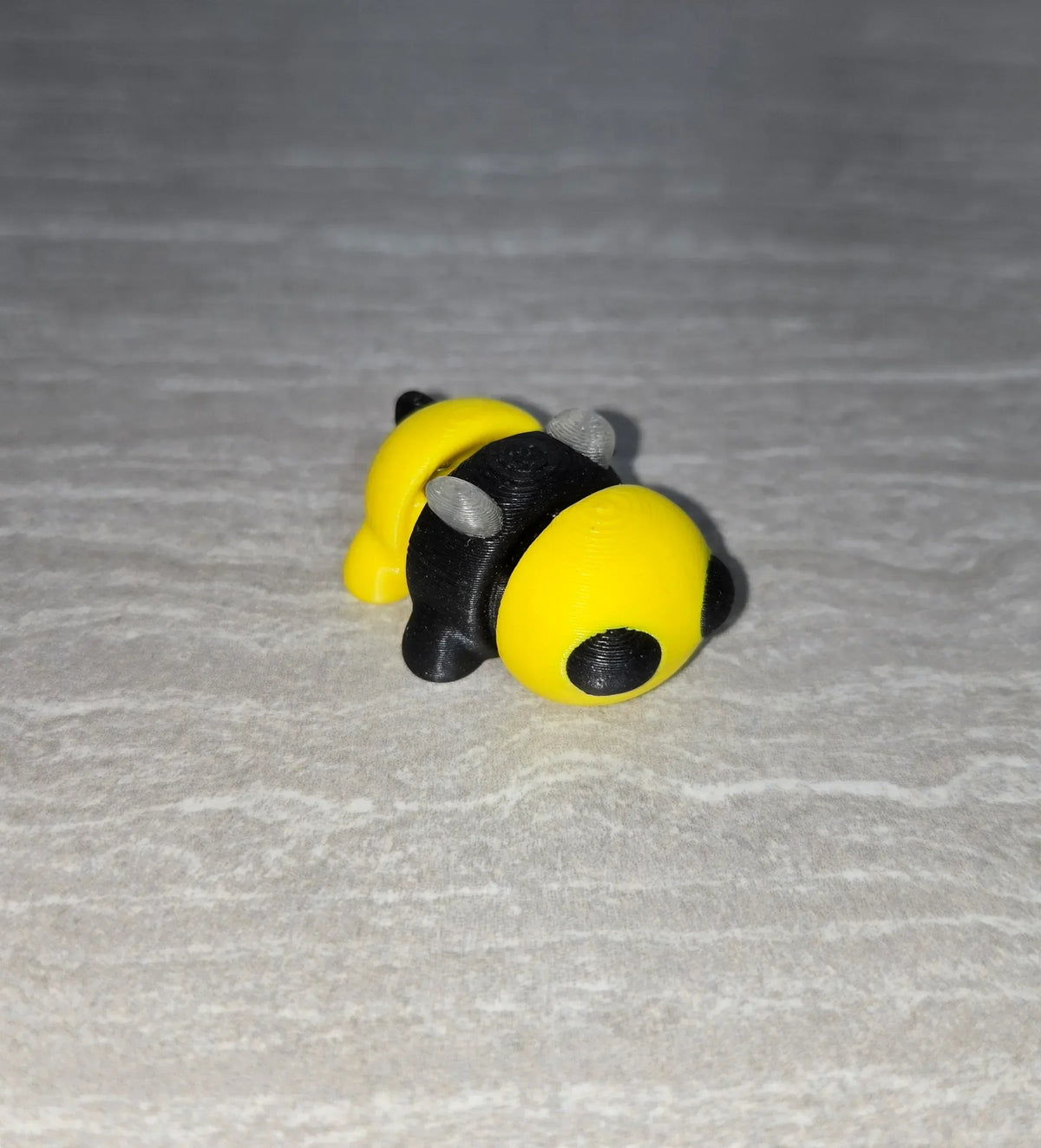 Bee 3D printed articulated flexi toy by Cosmic 3D Creations