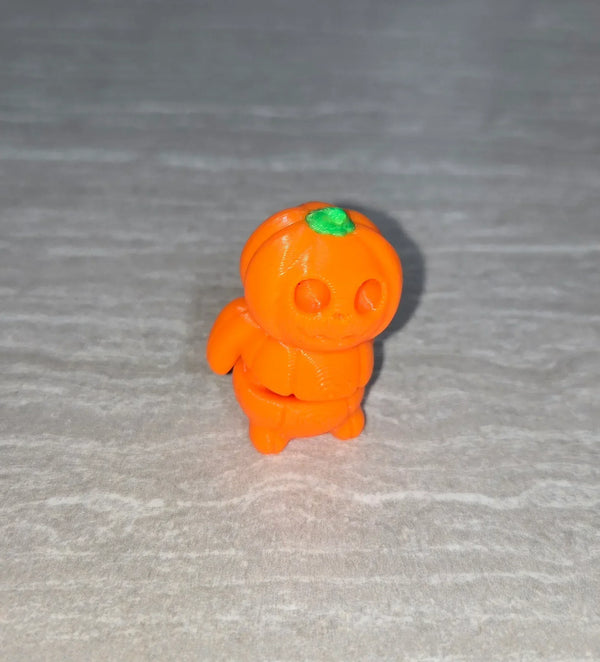 Pumpkin 3D printed articulated flexi toy by Cosmic 3D Creations