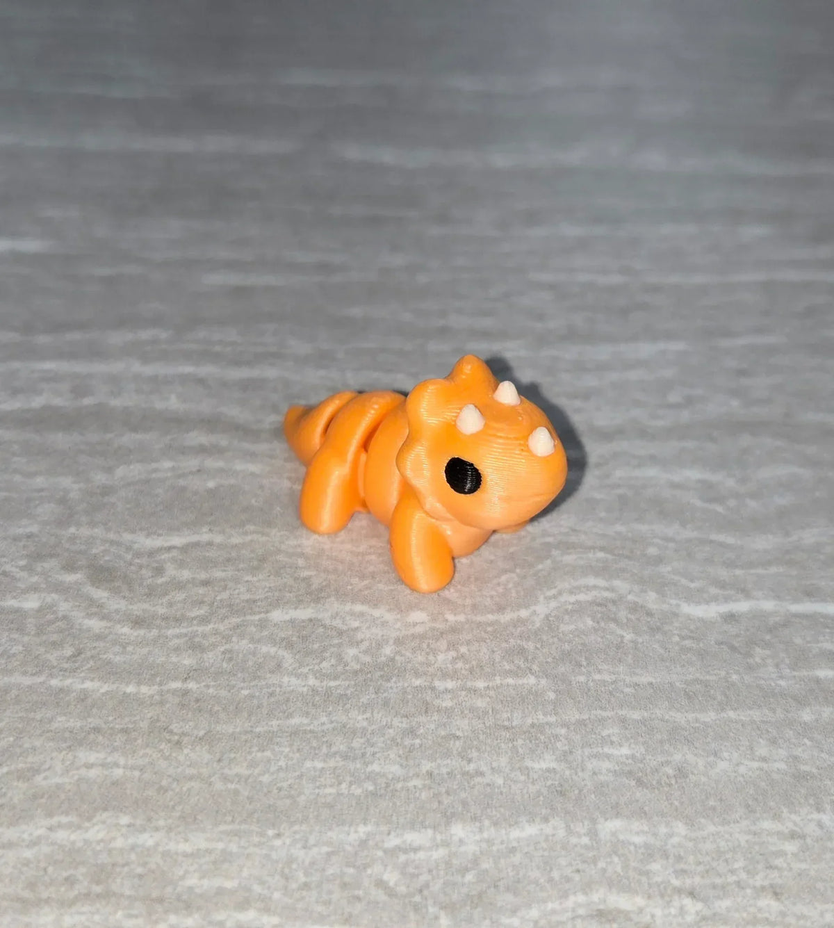 Triceratops 3D printed articulated flexi toy by Cosmic 3D Creations