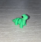 Brontosaurus 3D printed articulated flexi toy by Cosmic 3D Creations