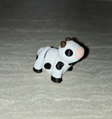 Cow w/ Spots 3D printed articulated flexi toy by Cosmic 3D Creations