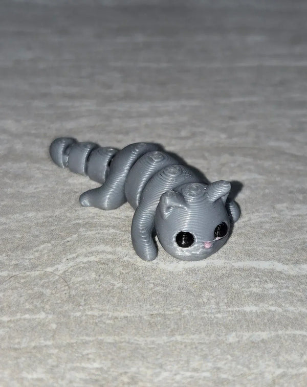 Cat 3D printed articulated flexi toy by Cosmic 3D Creations