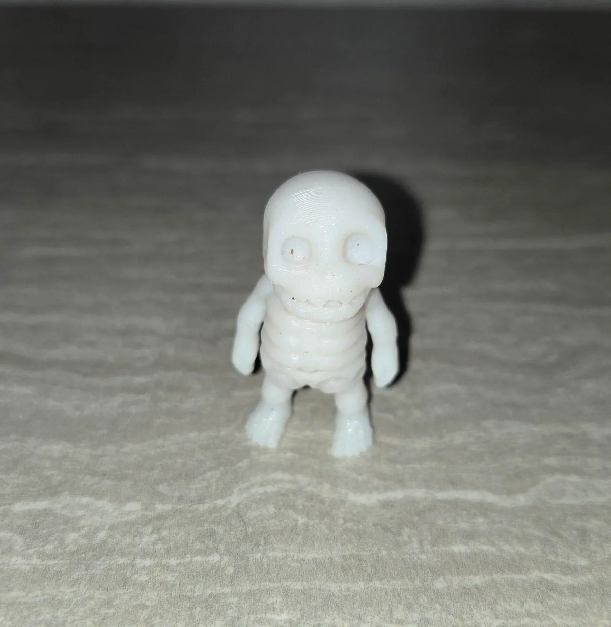 Skeleton 3D printed articulated flexi toy by Cosmic 3D Creations