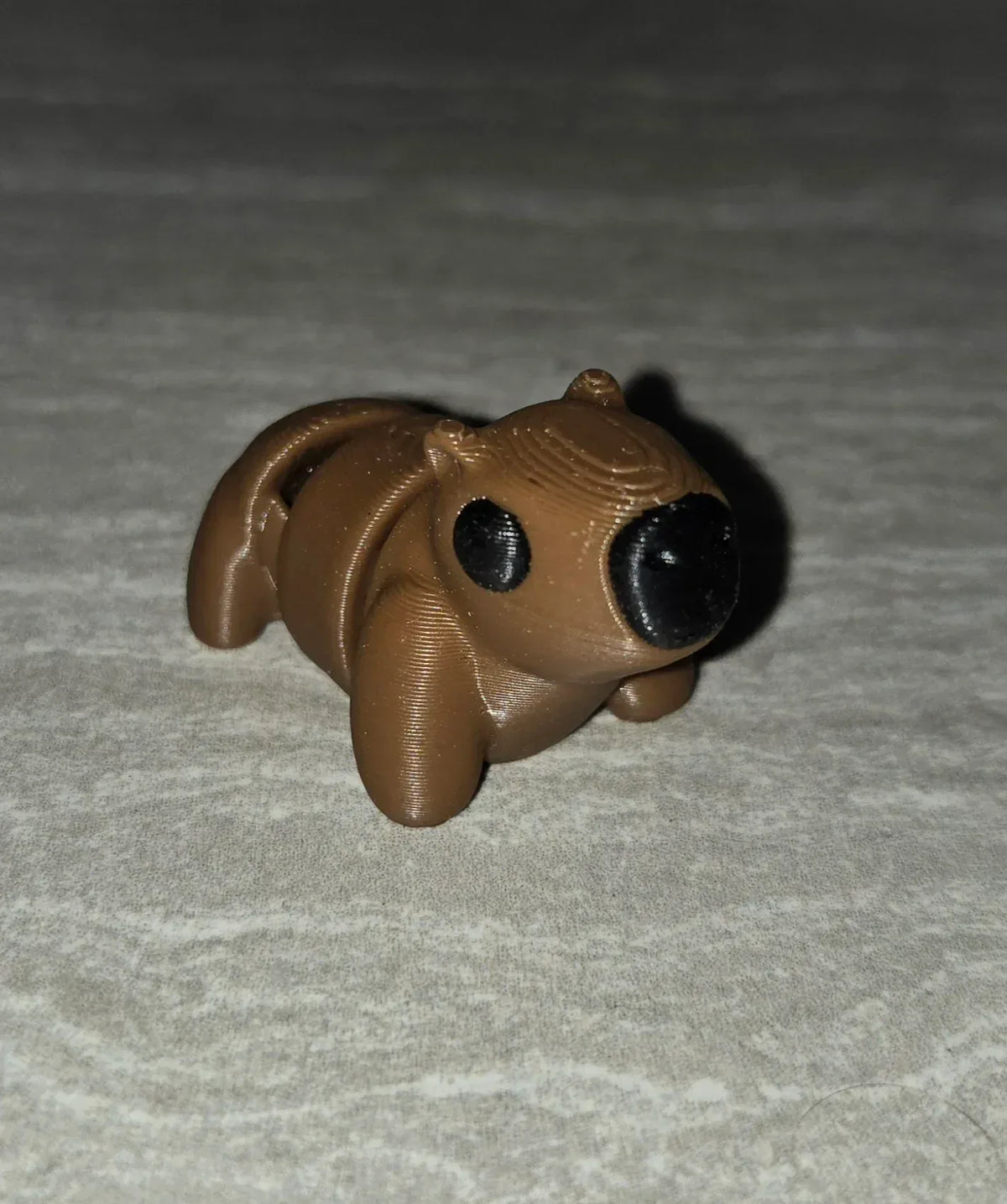 Capybara 3D printed articulated flexi toy by Cosmic 3D Creations