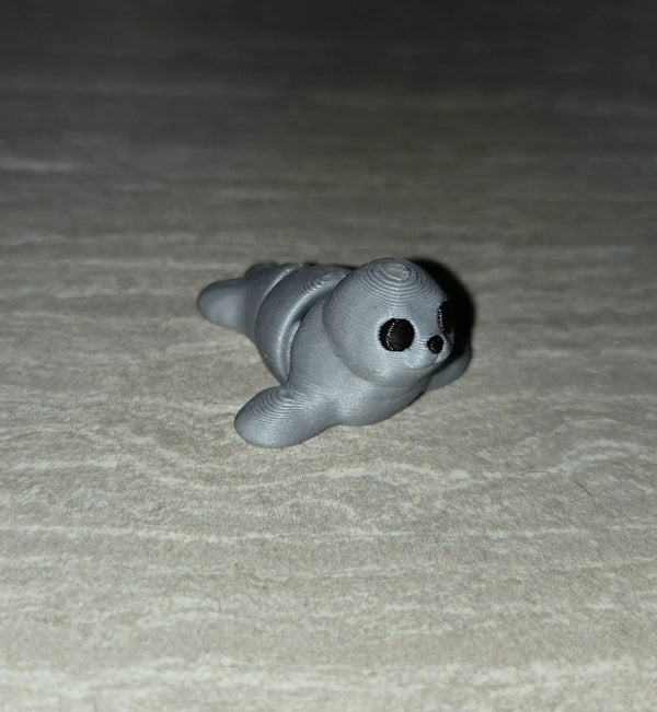 Seal 3D printed articulated flexi toy by Cosmic 3D Creations