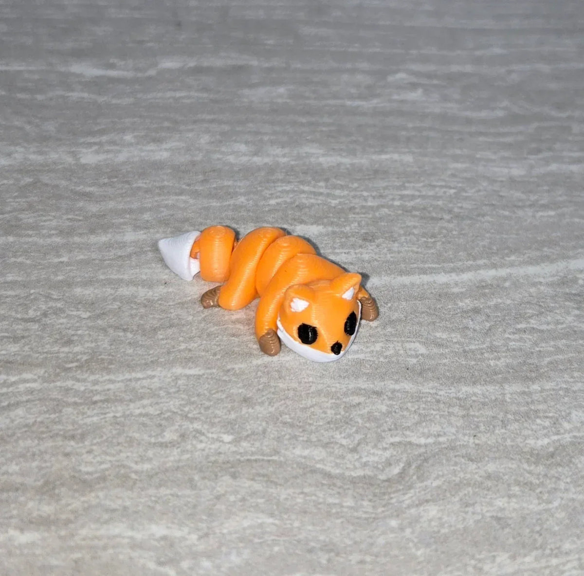 Fox 3D printed articulated flexi toy by Cosmic 3D Creations