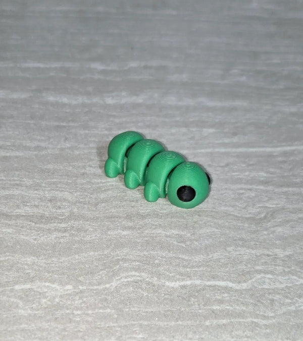 Round Caterpillar 3D printed articulated flexi toy by Cosmic 3D Creations