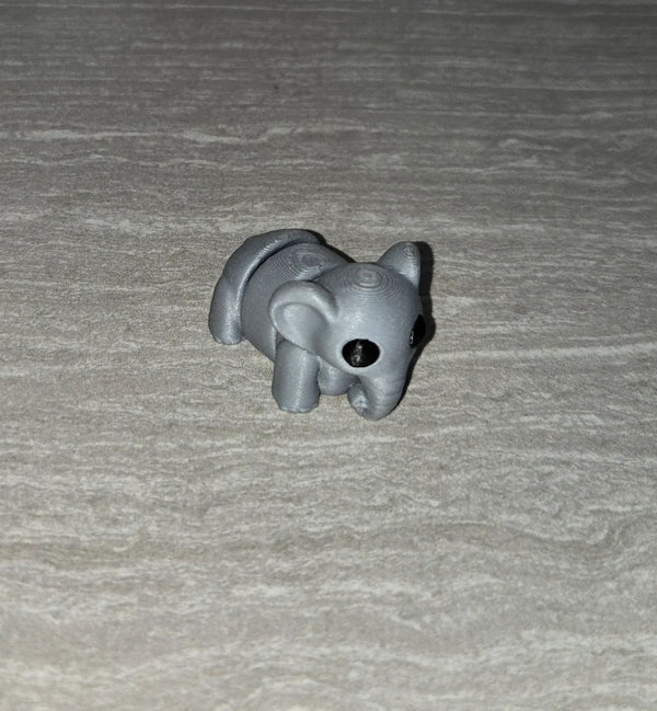 Elephant 3D printed articulated flexi toy by Cosmic 3D Creations