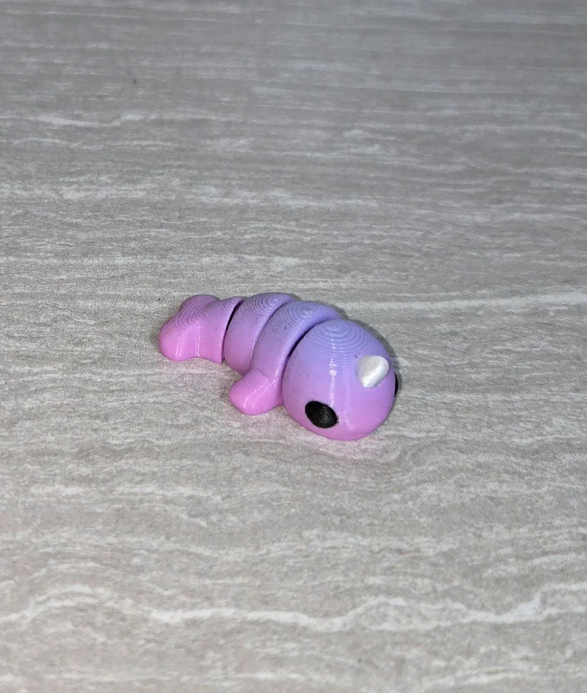 Narwhal 3D printed articulated flexi toy by Cosmic 3D Creations