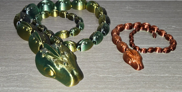 CinderSnake 3D printed articulated flexi toy by Cosmic 3D Creations