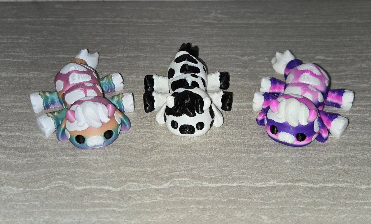 Stuffy Cow 3D printed articulated flexi toy by Cosmic 3D Creations