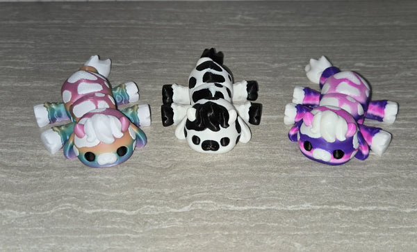 Stuffy Cow 3D printed articulated flexi toy by Cosmic 3D Creations