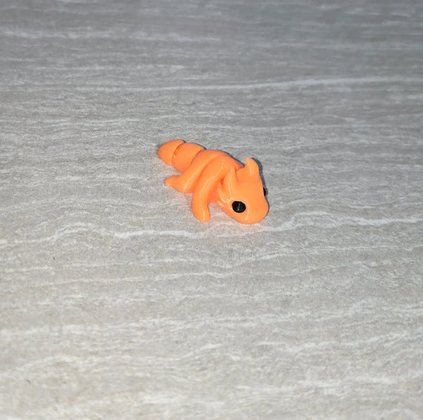 Dragon 3D printed articulated flexi toy by Cosmic 3D Creations