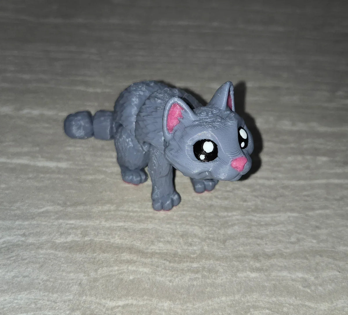 Mini Cat 3D printed articulated flexi toy by Cosmic 3D Creations
