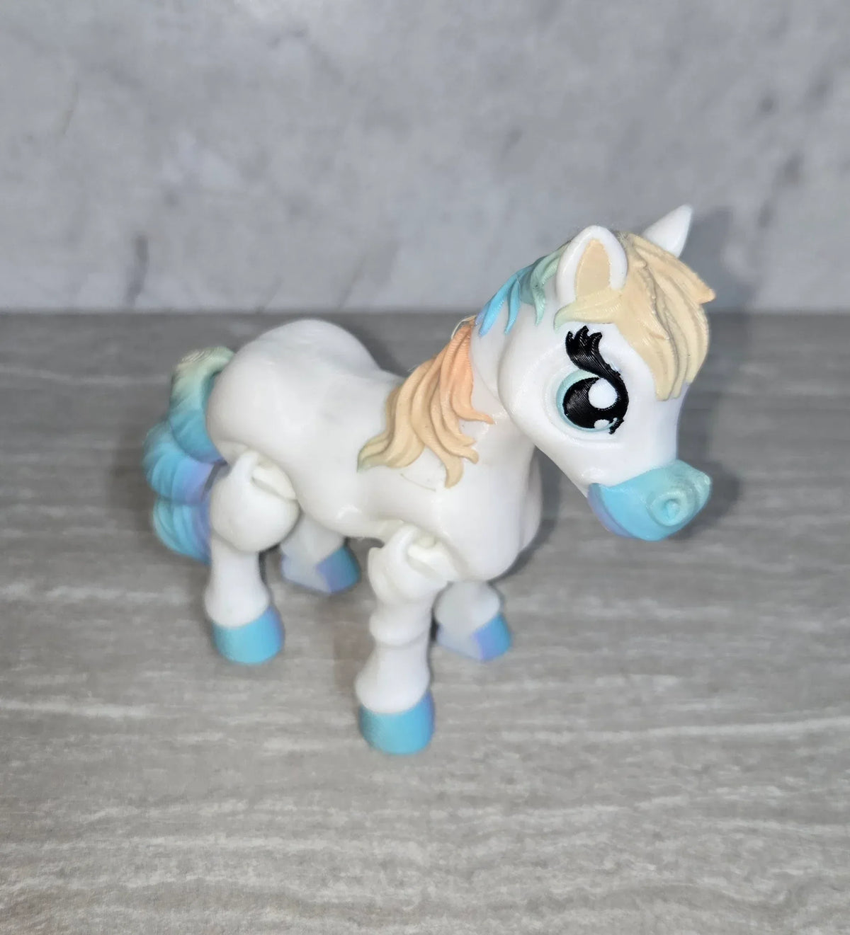 Pony 3D printed articulated flexi toy by Cosmic 3D Creations