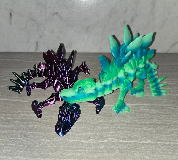 Skeleton Stegosaurus 3D printed articulated flexi toy by Cosmic 3D Creations