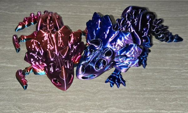 Skeleton Tricerotops 3D printed articulated flexi toy by Cosmic 3D Creations