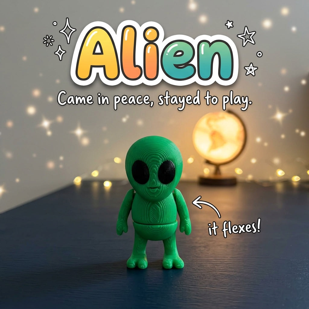 Alien 3D printed articulated flexi toy by Cosmic 3D Creations, on a desk with star lights