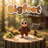 Bigfoot 3D printed articulated flexi toy by Cosmic 3D Creations, on a tree stump with moss and pine cones