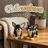 Chihuahua 3D printed articulated flexi toy by Cosmic 3D Creations, on a cozy side table with a knit blanket