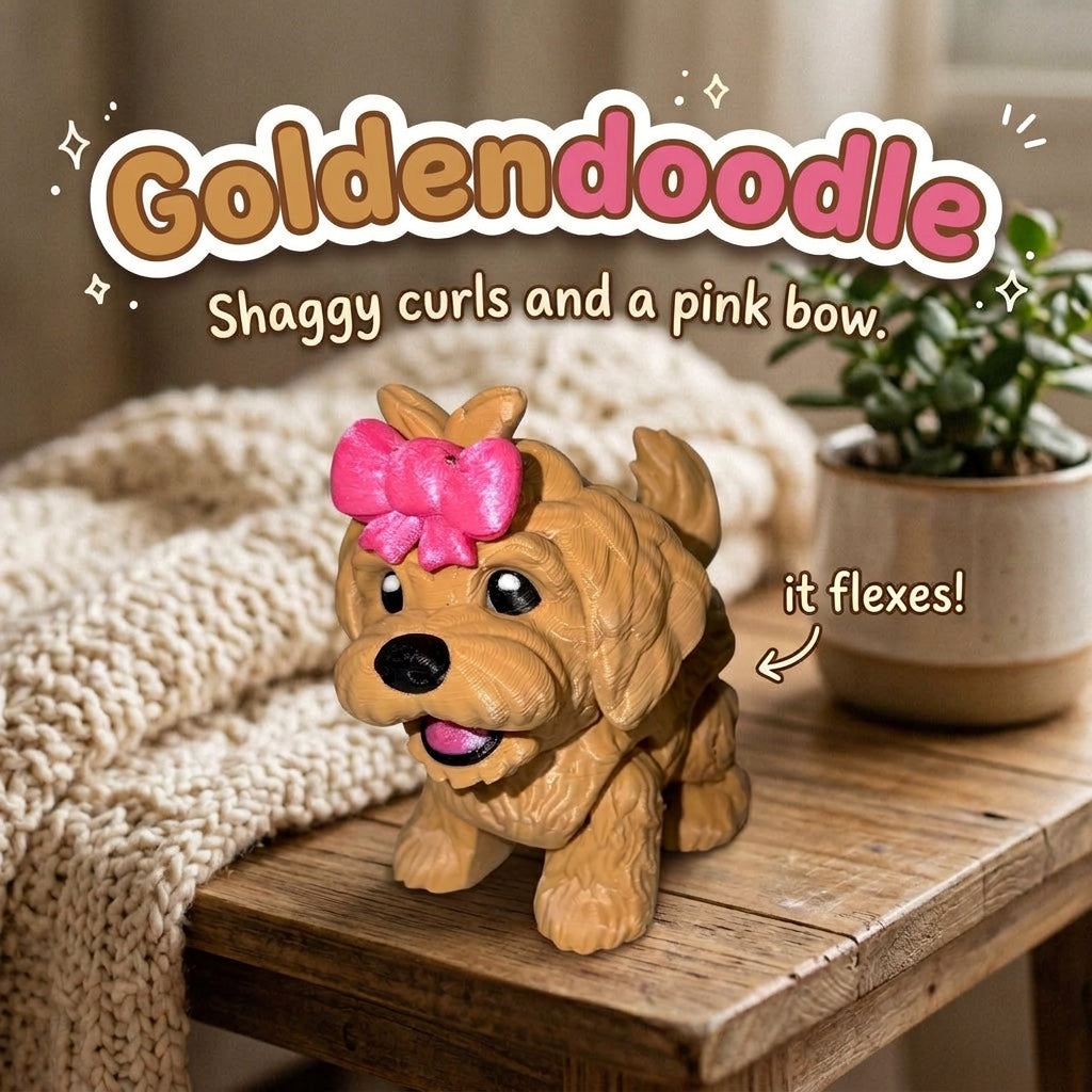 Goldendoodle 3D printed articulated flexi toy with a pink bow by Cosmic 3D Creations, on a cozy side table with a knit blanket