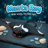 Manta Ray 3D printed articulated flexi toy by Cosmic 3D Creations, on slate with shells and sea glass