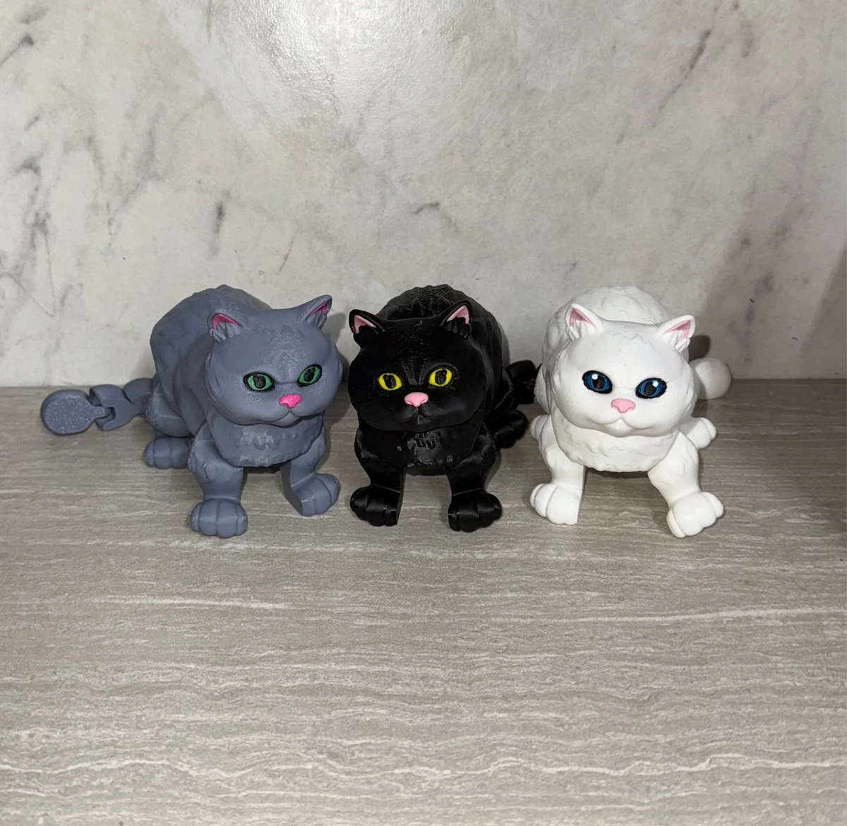 Chubby Cat 3D printed articulated flexi toy by Cosmic 3D Creations