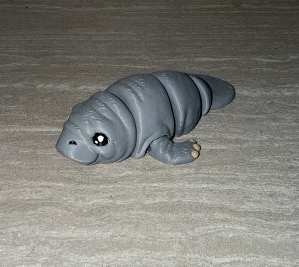 Manatee 3D printed articulated flexi toy by Cosmic 3D Creations