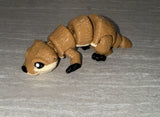 Otter 3D printed articulated flexi toy by Cosmic 3D Creations