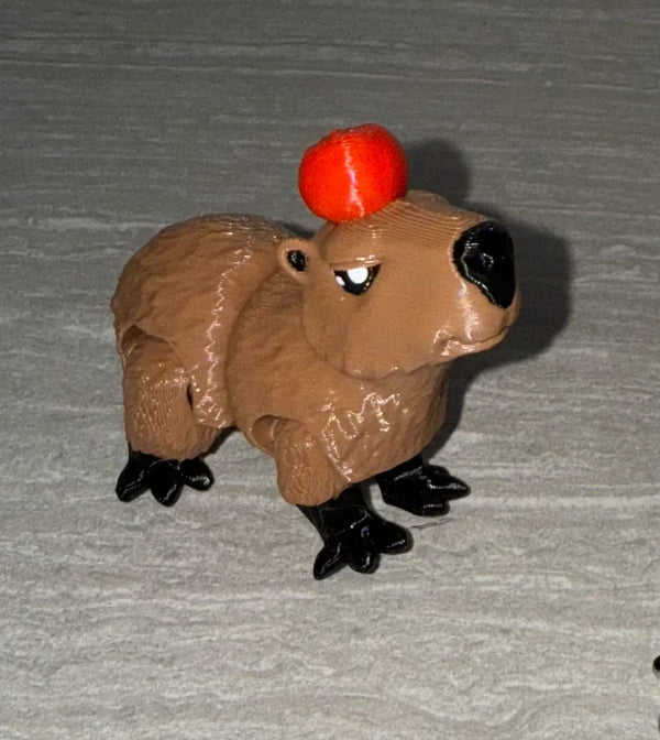 Capybara With Apple 3D printed articulated flexi toy by Cosmic 3D Creations