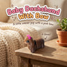 Baby Dachshund With Bow 3D printed articulated flexi toy, on a cozy side table with a knit blanket