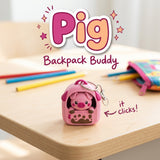 Pig Backpack Buddy 3D printed clicker fidget keychain on a school desk