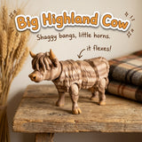 Big Highland Cow 3D printed articulated flexi toy by Cosmic 3D Creations, on a farmhouse shelf with wheat