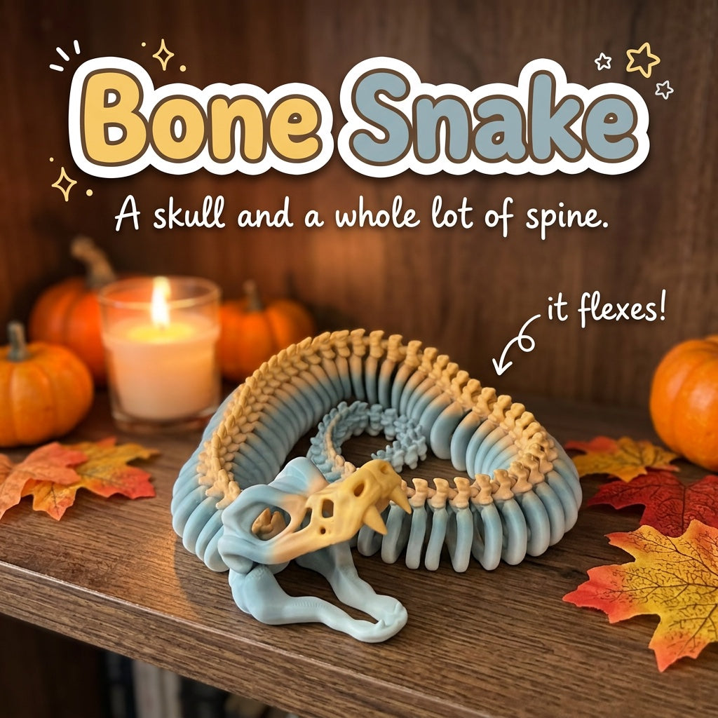 Bone Snake 3D printed articulated flexi toy by Cosmic 3D Creations, on a cozy autumn shelf with pumpkins