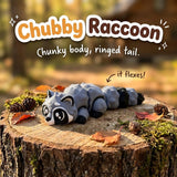 Chubby Raccoon 3D printed articulated flexi toy by Cosmic 3D Creations, on a tree stump with moss and pine cones